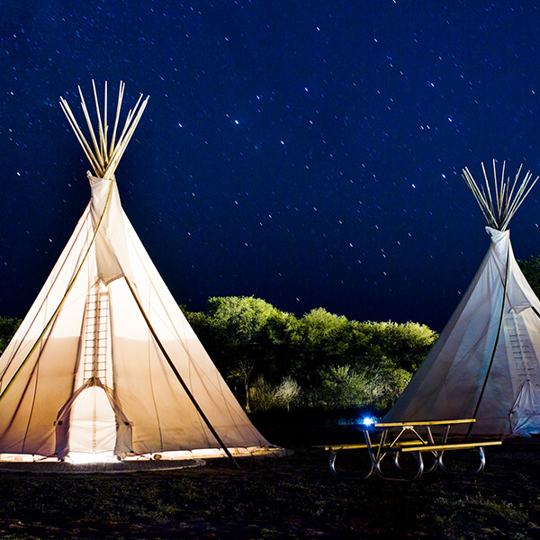 Glamping is growing up, edging closer to brick-and-mortar hotel experiences...